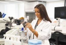 Woman-in-laboratory-in-white-coate