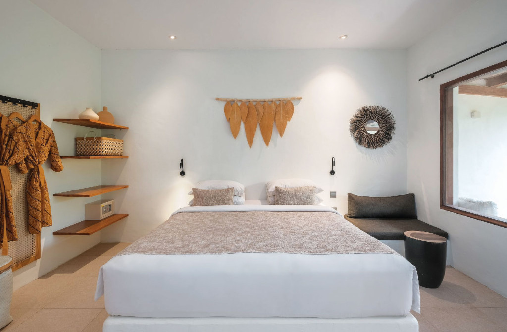 Minimalist tropical suite with earthy tones and textures.