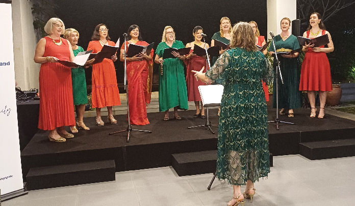 ANZA Singing group performing on stage in Dec 2024