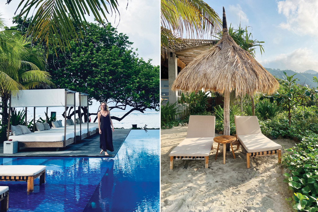 Luxury poolside beds and beach loungers under palms.