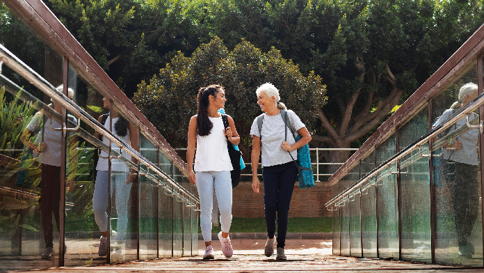 Joyful walk together, bonding through conversation and exercise.