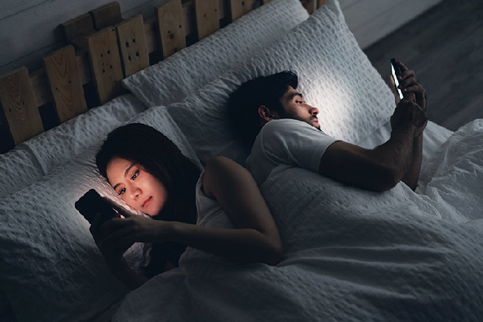 Together physically, but divided by digital screens.